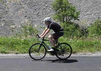 Cyclists riding on a mountain road