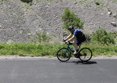 Cyclists riding on a mountain road