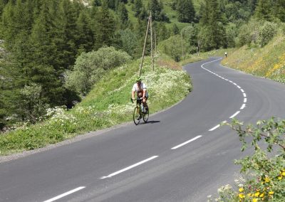 Cyclists riding on a mountain road