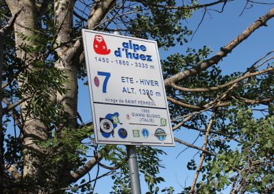 Road marker for corner 7 on Alpe d'Huez mountain road